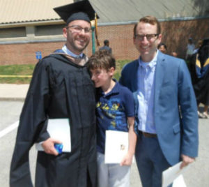 La Salle MBA graduate Hank Sharkey with his son and brother
