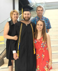 MBA graduate Josh Kohler with his family